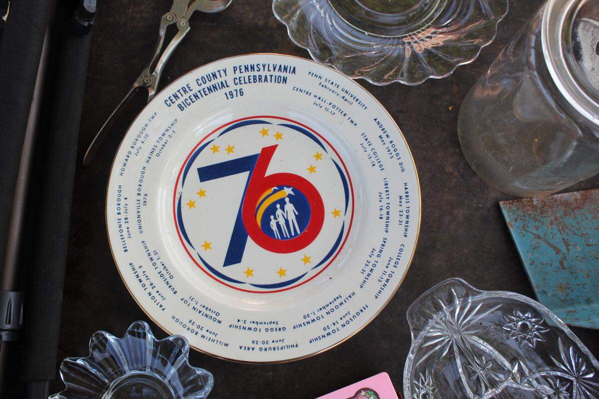 A plate commemorating the 1976 Centre County Pennsylvania Bicentennial Celebration found Friday at the 100 Mile Yard Sale that takes place in parts of Cameron, Centre, Clearfield and Elk counties.