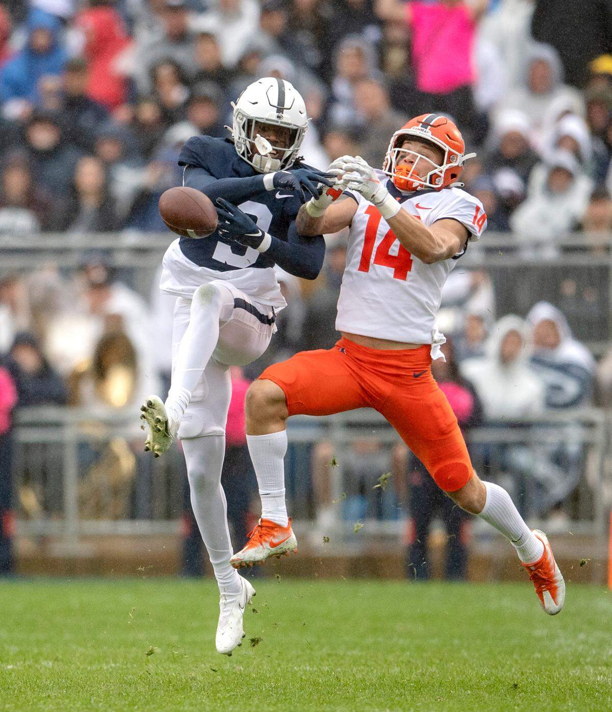 Penn State cornerback Joey Porter Jr. breaks up a pass intended for Illinois wide receiver Casey Washington during the game on Saturday, Oct. 23, 2021.