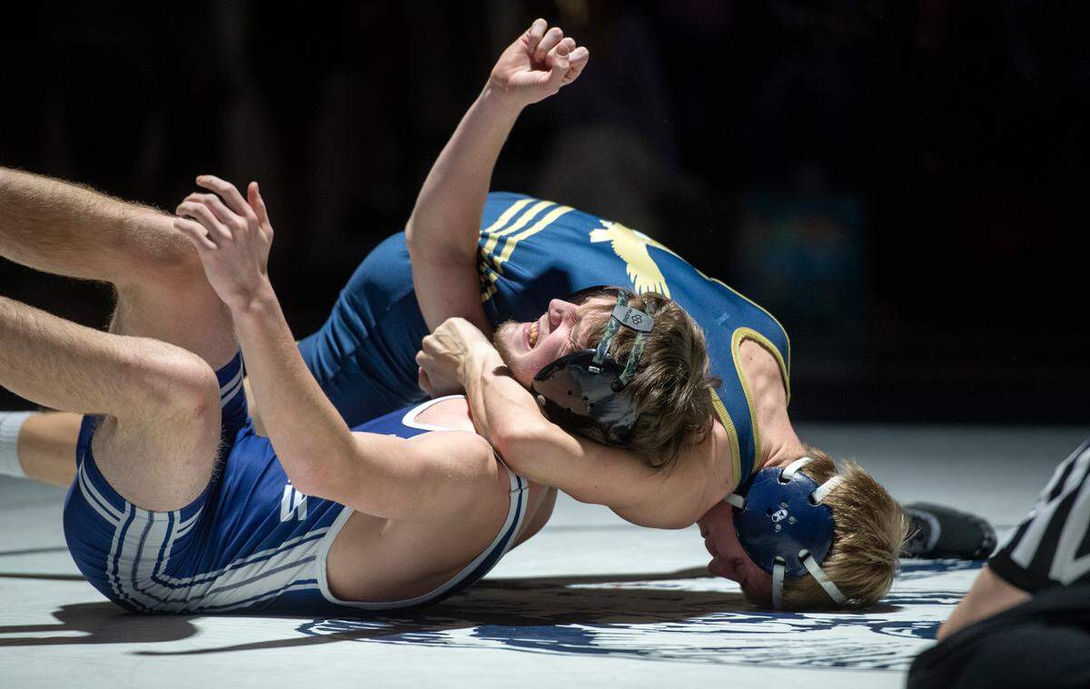 Bald Eagle Area’s Kevin Taylor controls Penns Valley’s Nick Cain in the 132 lb bout of the match on Wednesday, Jan. 12, 2022.