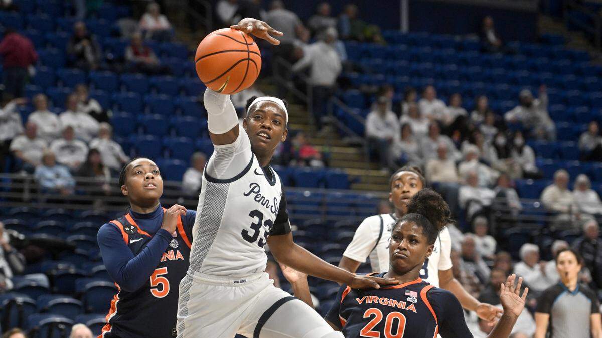 Penn State’s Johnasia Cash fights for the ball with Virginia defenders during the game on Wednesday, Nov. 30, 2022.