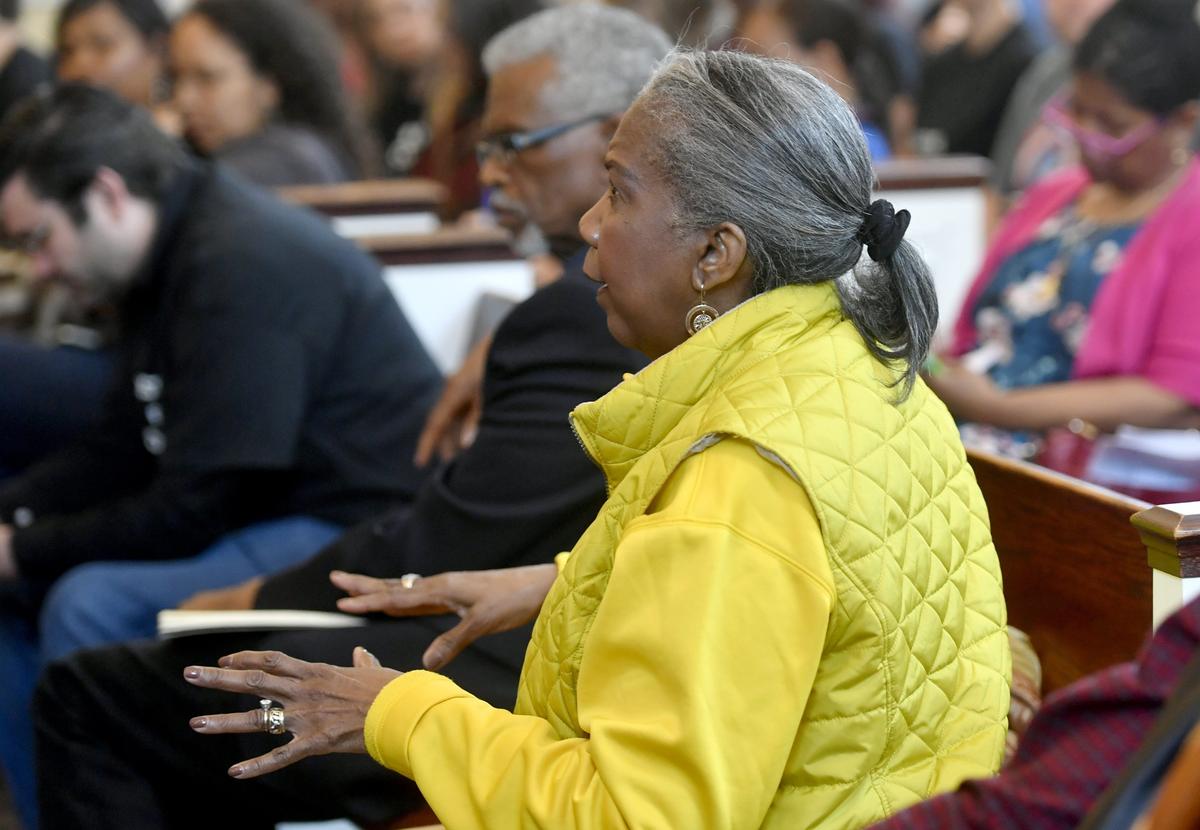 Dr. Barbara Farmer and fellow community members fill a room at the Centre County Courthouse Wednesday to question officers about the investigation of the death of Osaze Osagie, which was deemed justified.