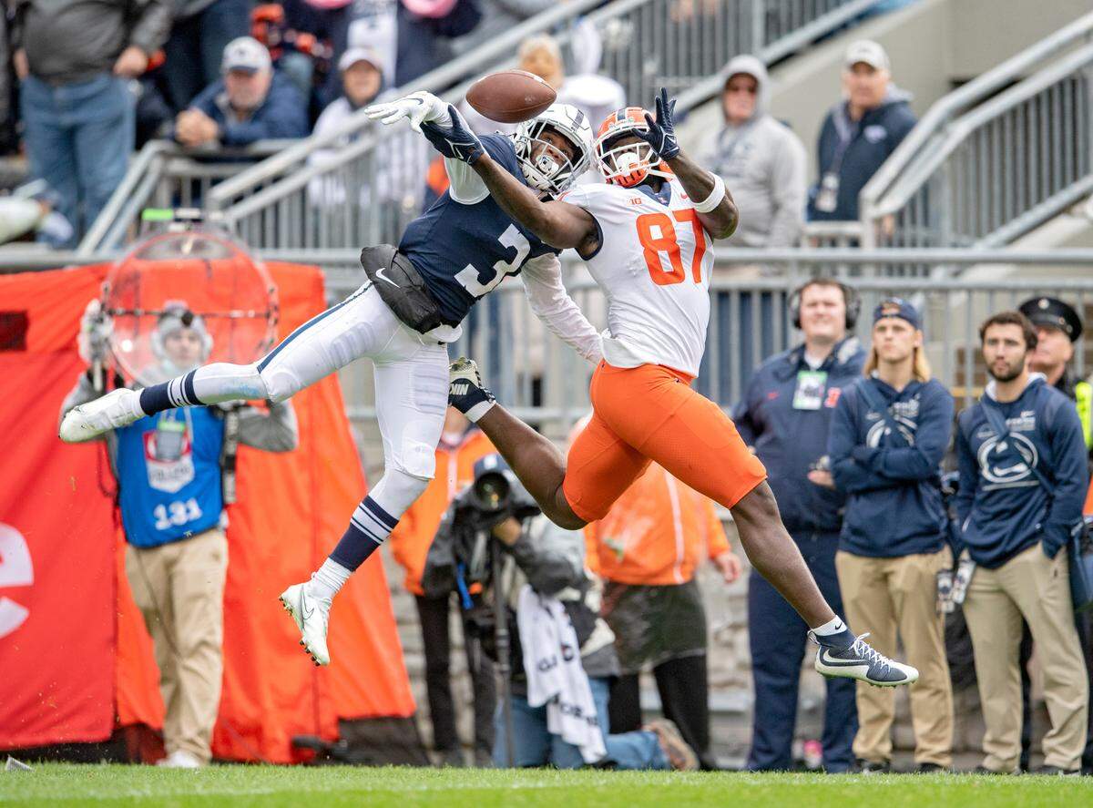 Penn State cornerback Johnny Dixon breaks up a pass intended for Illinois tight end Daniel Barker during the fourth quarter of the game on Saturday, Oct. 23, 2021.
