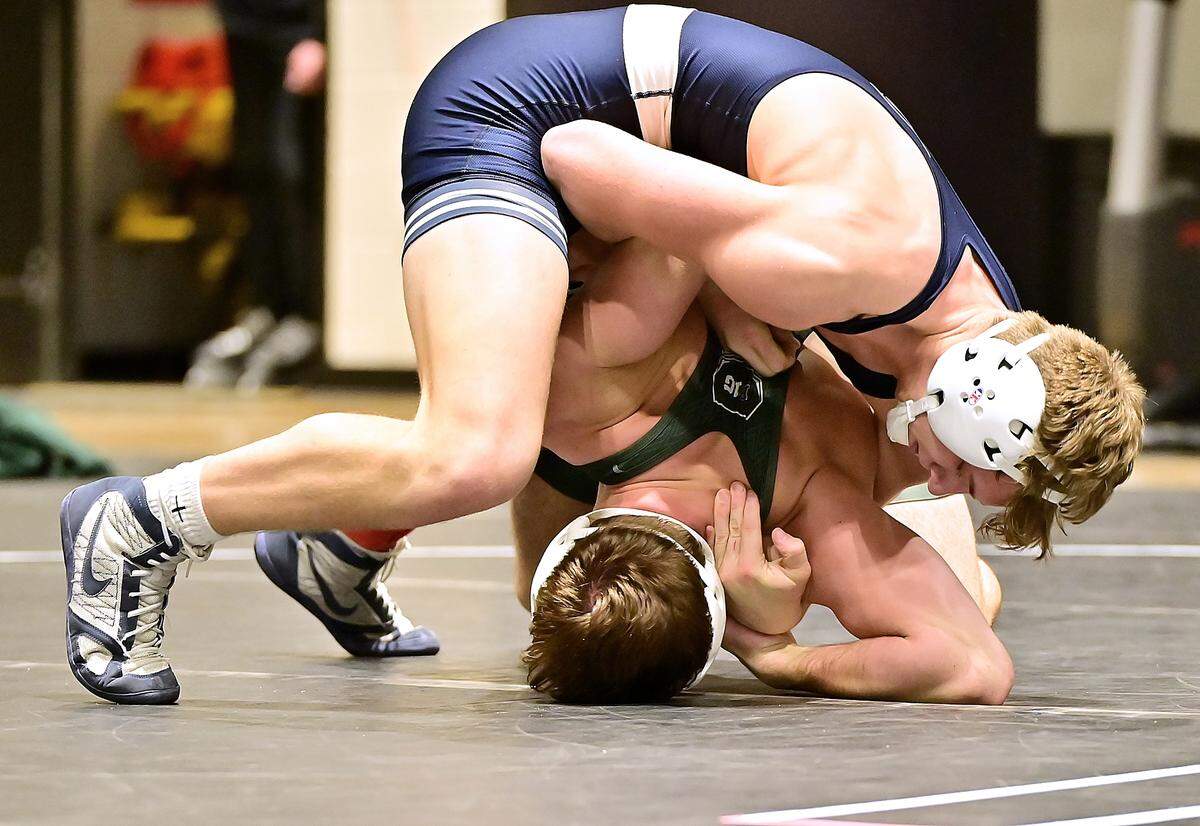 Penn State’s Ty Watson, who is a Penns Valley grad, looks to put Michigan State’s Cam Adams on his back in their 165-pound consolation match of the Black Knight Invitational on Sunday in West Point, NY. Watson pinned Adams for his first collegiate win.