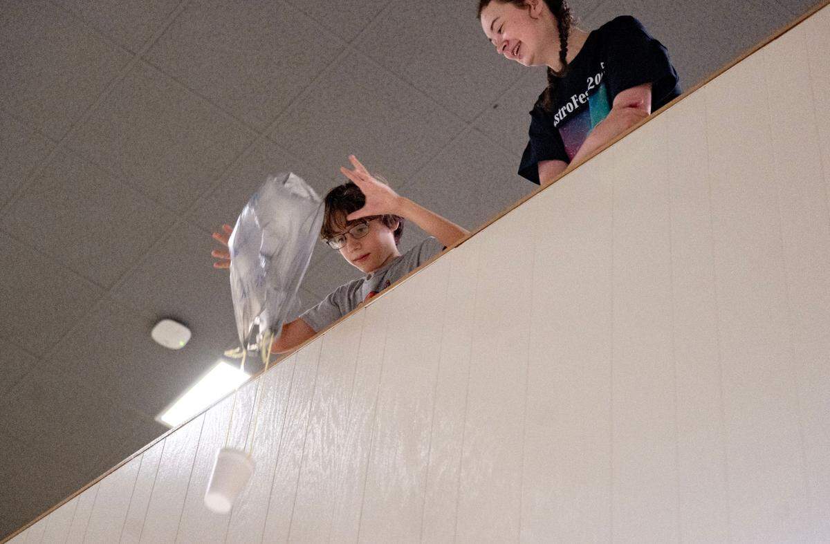 Owen Ferragutto, 11, participates in the egg drop during Penn State Eberly College of Science’s AstroFest on Wednesday, July 9, 2025.