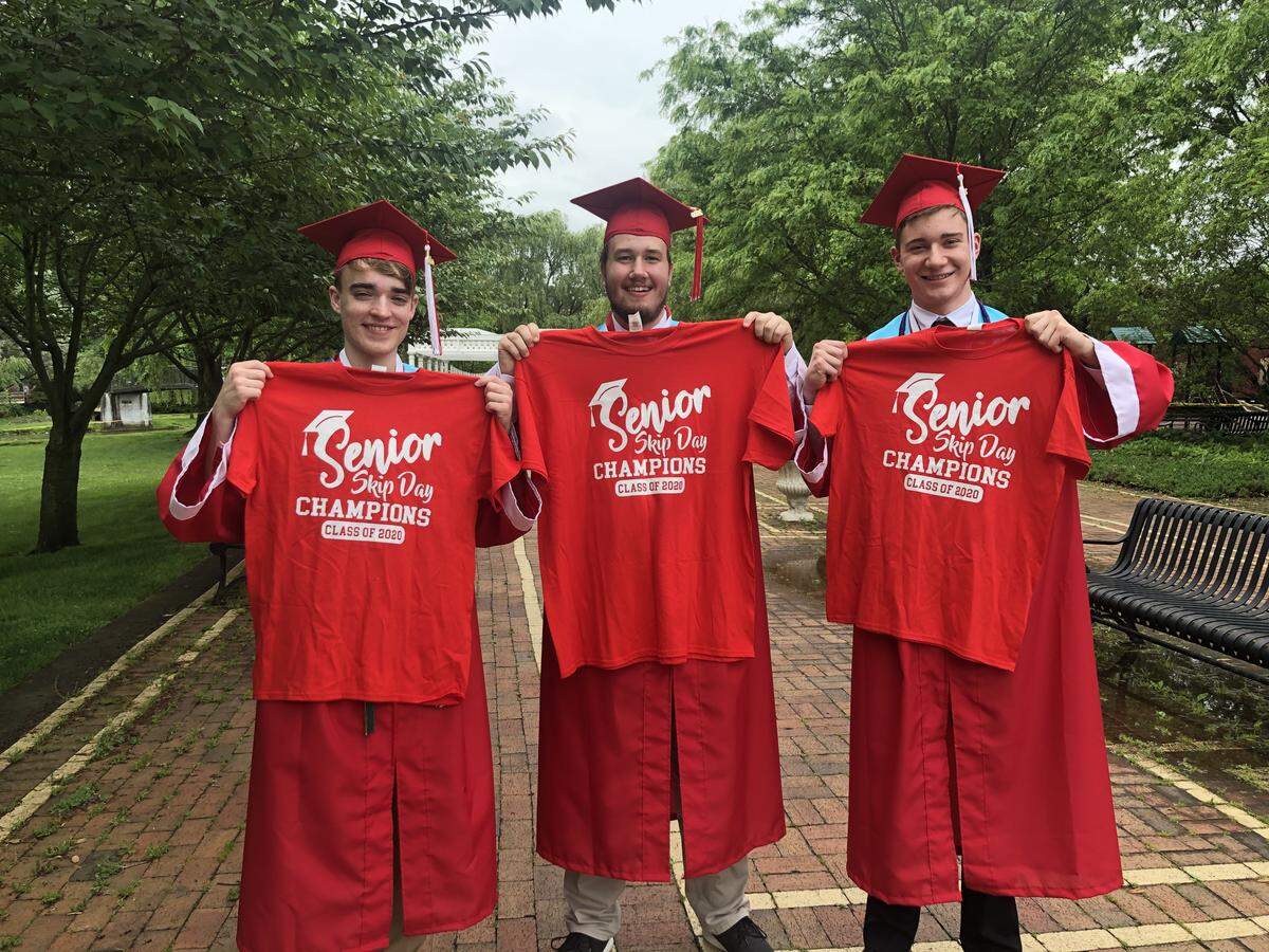 Bellefonte Area School District graduates Owen Christopher, Nolan Putnam and Austin Craig graduated in a drive-thru ceremony on Friday.