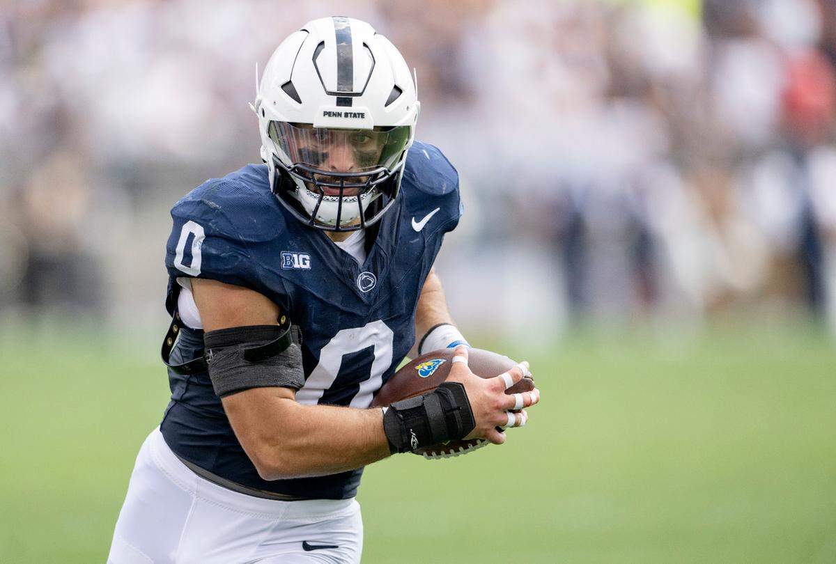 Penn State linebacker Dominic DeLuca intercepts a pass and runs it back for a touchdown during the game against Delaware on Saturday, Sept. 9, 2023.