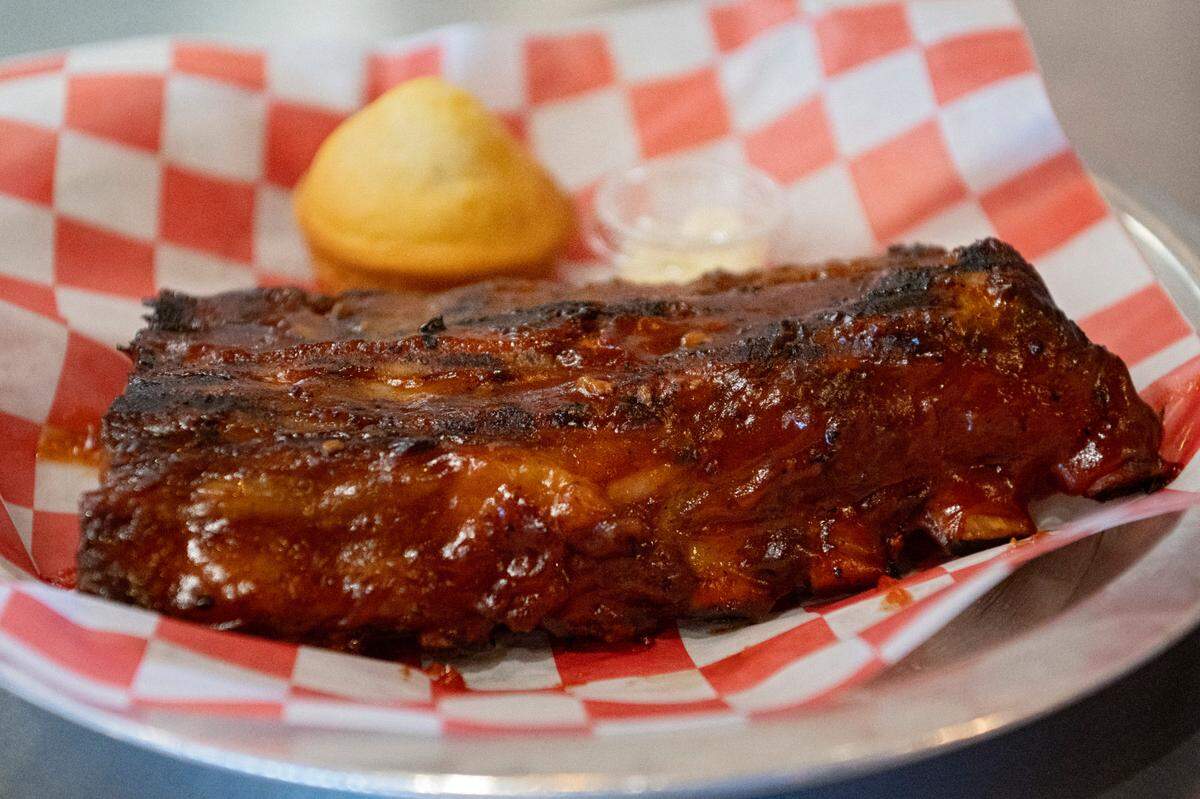 An order of ribs with a cornbread muffin at Prospector’s on Thursday, June 1, 2023.