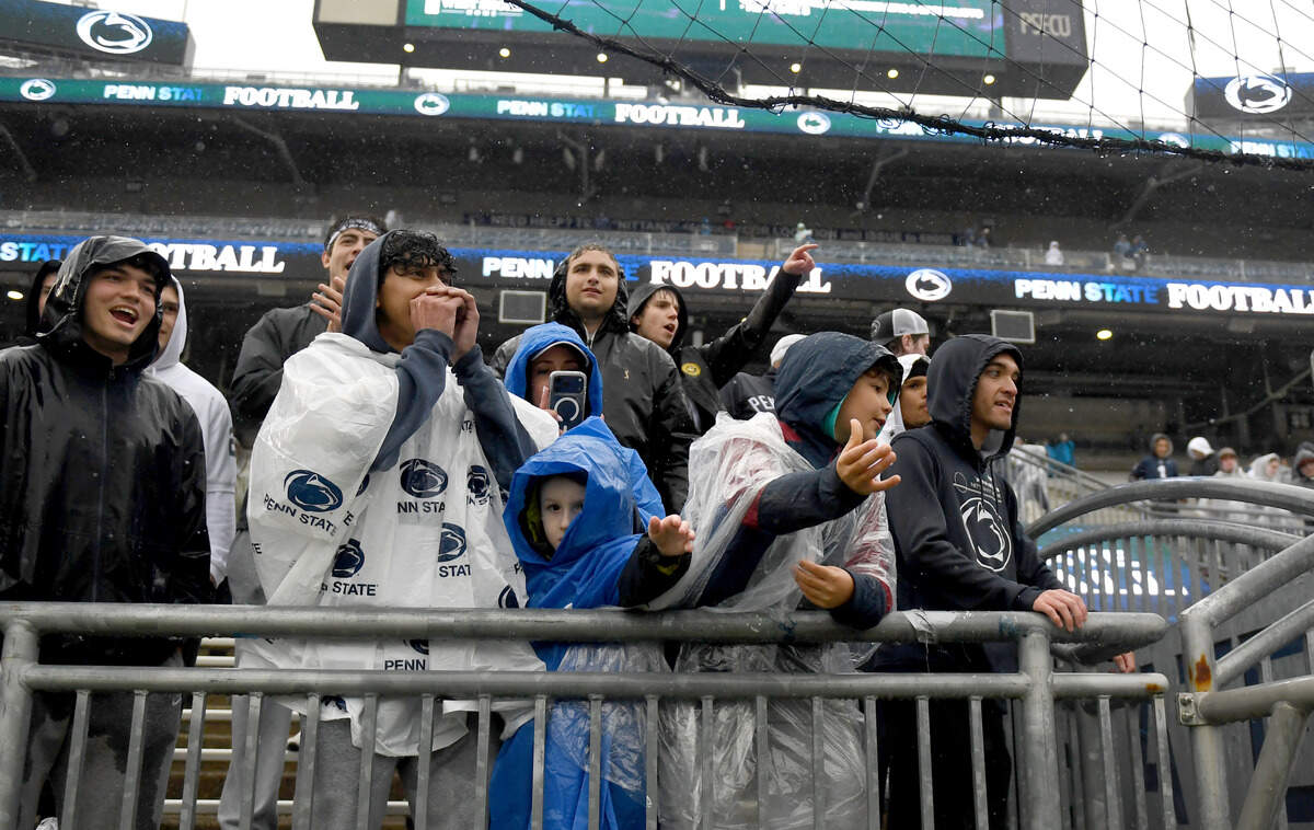 Penn State fans cheer as players walk by after the Blue-White Practice on Saturday, April 25, 2026.