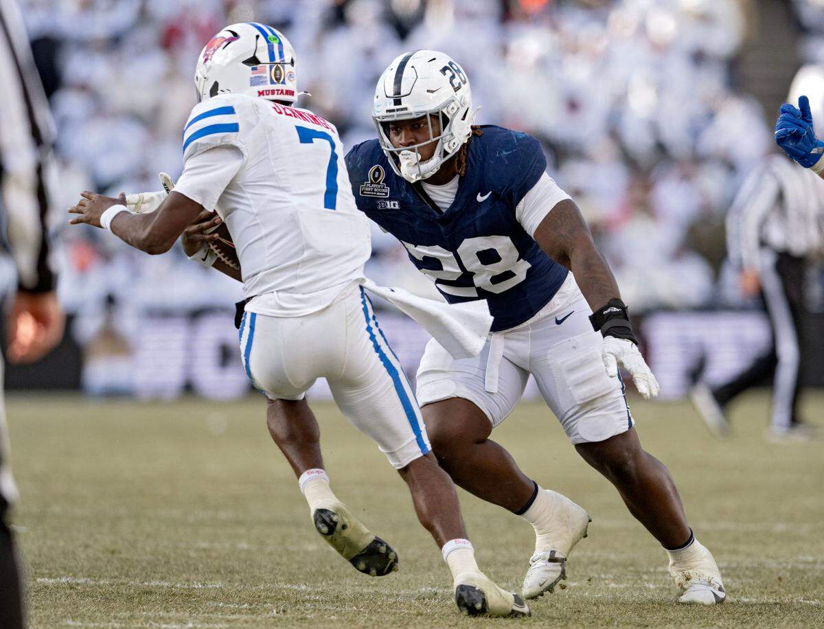Penn State defensive tackle Zane Durant reaches to sack SMU quarterback Kevin Jennings during the game on Saturday, Dec. 21, 2024 at Beaver Stadium.