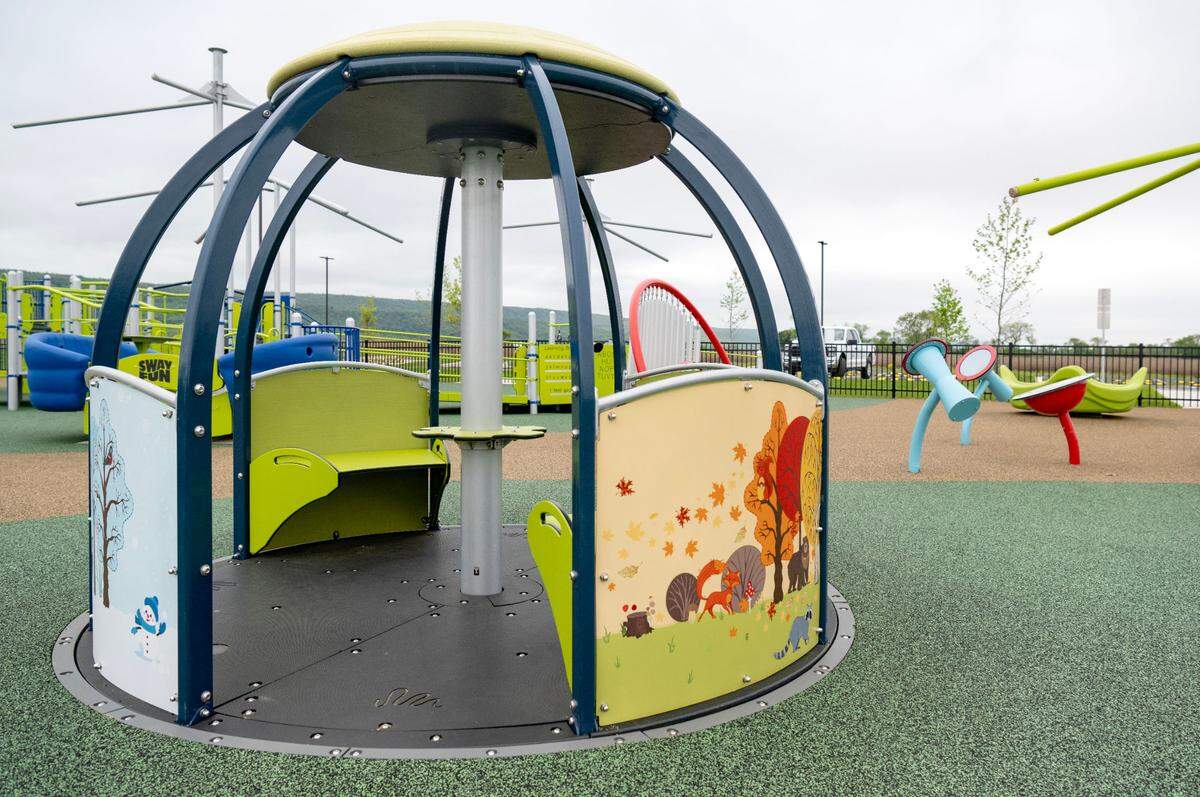 A accessible merry-go-round is part of the all-abilities playground at Whitehall Road Regional Park.
