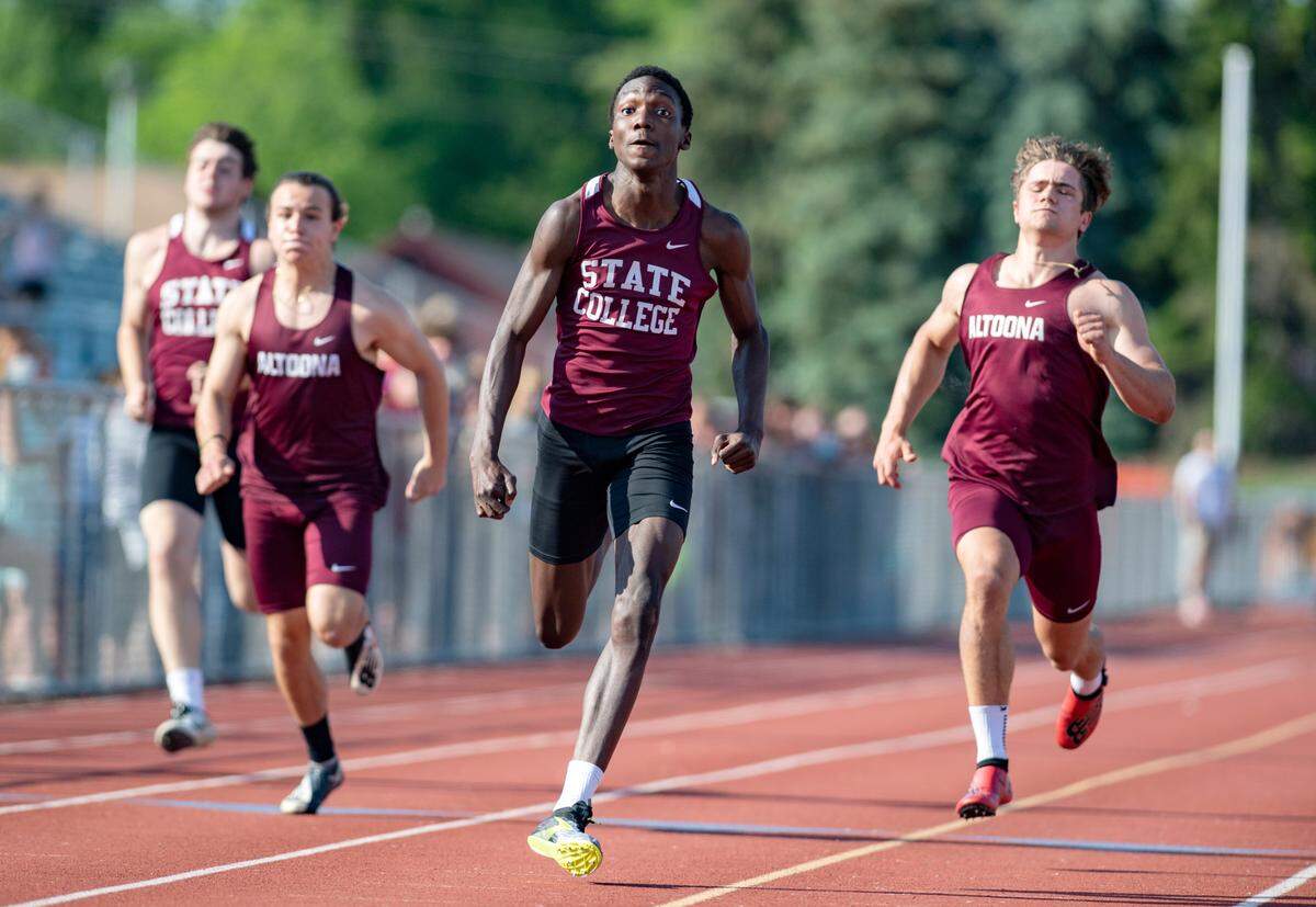 State CollegeÕs Eniayo Ogunranti takes first in the 100 meter dash at the District 6 3A track and field championships at Mansion Park on Thursday, May 20, 2021.