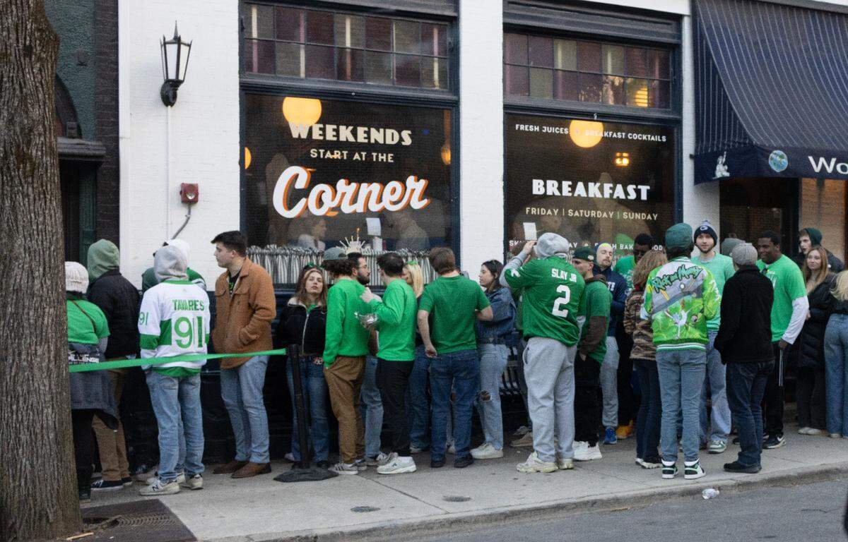 People lined up for bars on the street of downtown State College for State Patty’s Day in 2025.