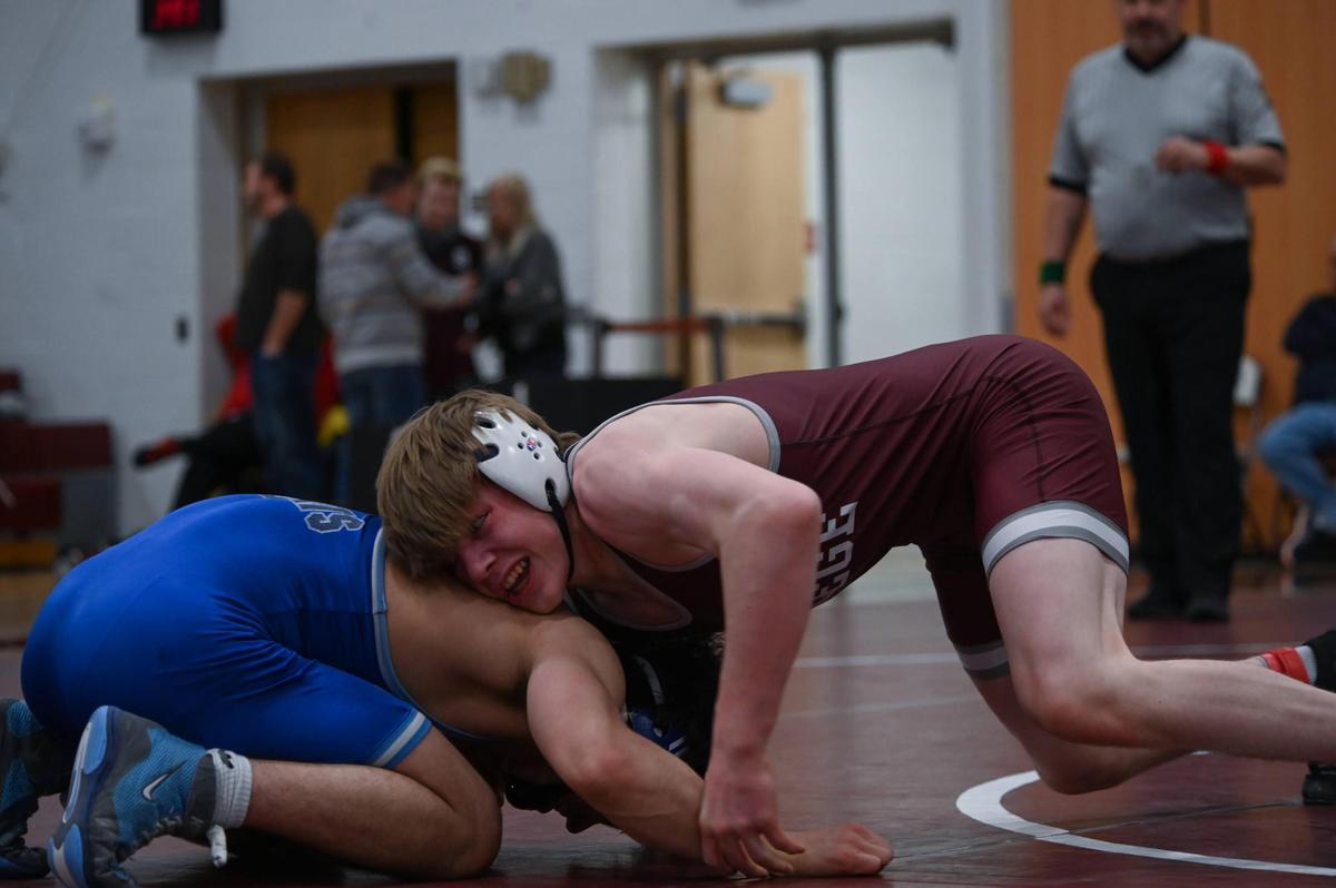 State College’s Asher Cunningham controls Central Mountain’s Griffin Walizer in their 145-pound finals match of the PIAA Class 3A Northwest Regional Championships on Saturday, Feb. 25, 2023 in Altoona. Cunningham beat Walizer, 2-0.
