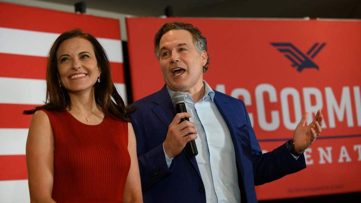 PITTSBURGH, PA - MAY 17: Pennsylvania Republican Senate candidate Dave McCormick and his wife, Dina Powell McCormick, speak to supporters at the Indigo Hotel during a primary election night event on May 17, 2022 in Pittsburgh, Pennsylvania. Polls reveal McCormick holds a close lead over Dr. Mehmet Oz as the Republican primary race is still too close to call. (Photo by Jeff Swensen/Getty Images)
