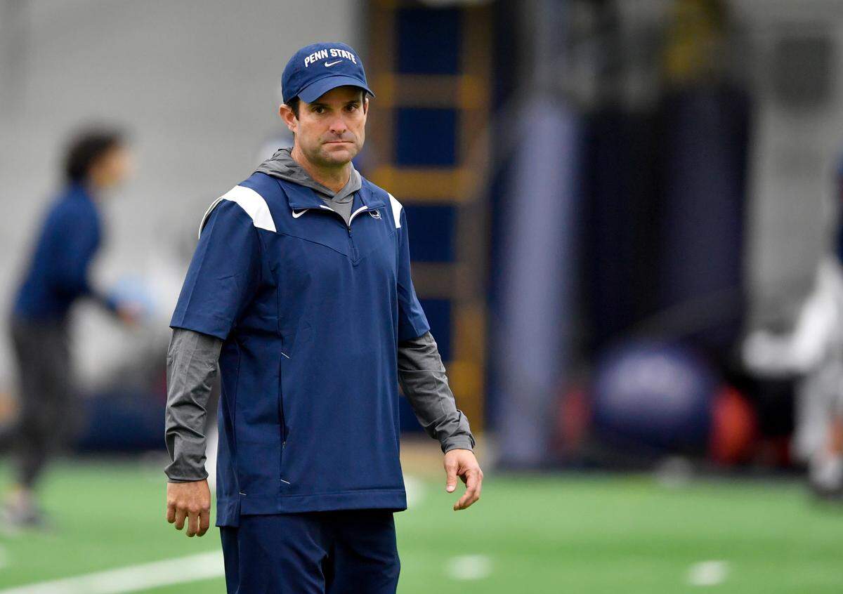 Newly hired defensive coordinator Manny Diaz watches Penn State football practice on Friday, Dec. 17, 2021.