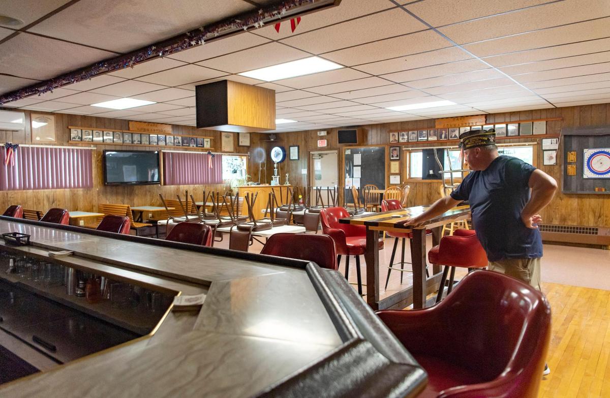 Snow Shoe VFW Post 5644 Commander Mike Guenot looks around the empty space on Thursday, July 23, 2020. Due to Pennsylvania’s new restrictions from the COVID-19 pandemic, the bar cannot be open currently, which will hurt how the organization supports the community in the future.