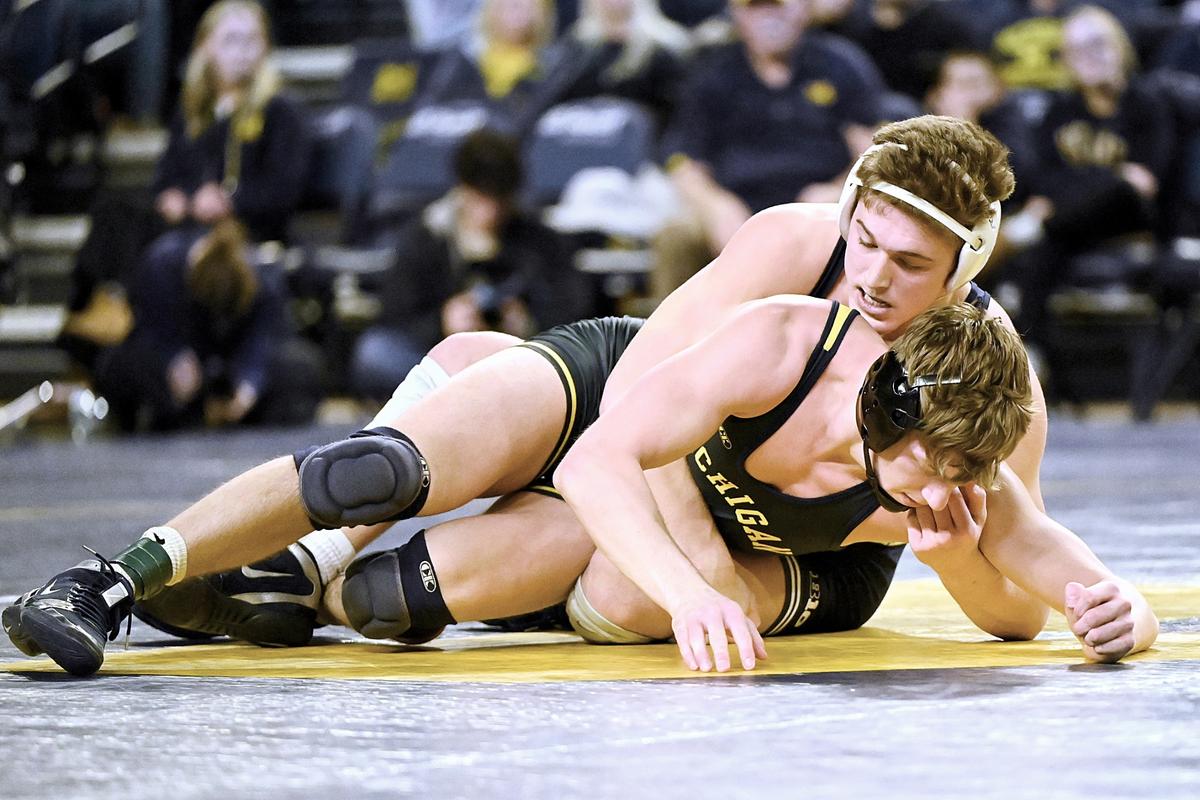 Penn State’s Terrell Barraclough controls Michigan’s Shane Griffith in their 174 pound bout of the Nittany Lions’ 27-9 win on Friday night in Ann Arbor, Mich. Griffith, who is a former NCAA champion, topped Barraclough, who filled in for Carter Starocci, 2-1.