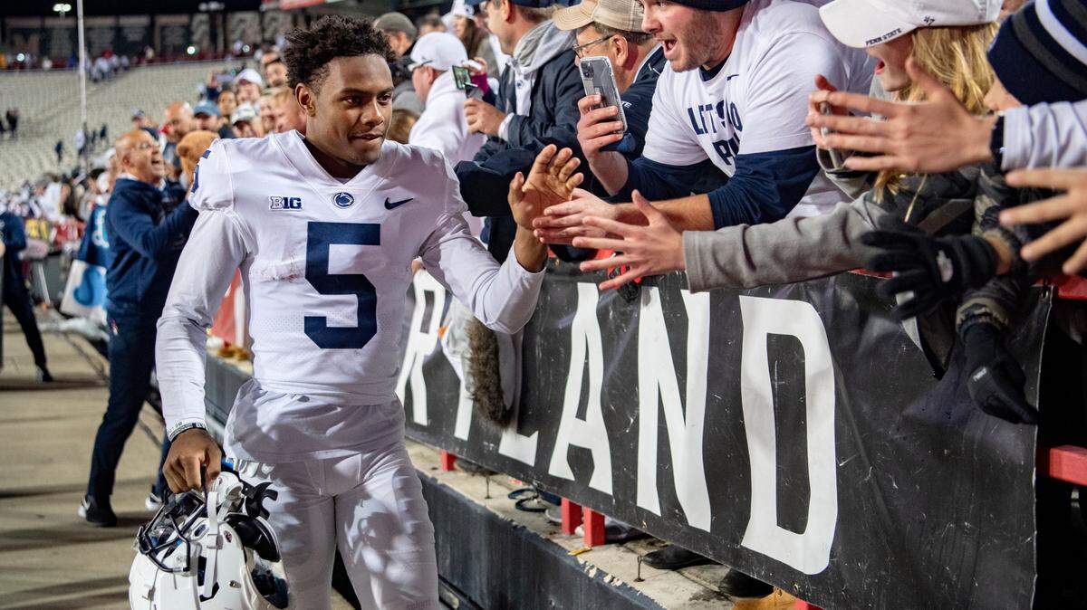 Penn State wide receiver Jahan Dotson high fives fans after the win over Maryland on Saturday, Nov. 6, 2021.