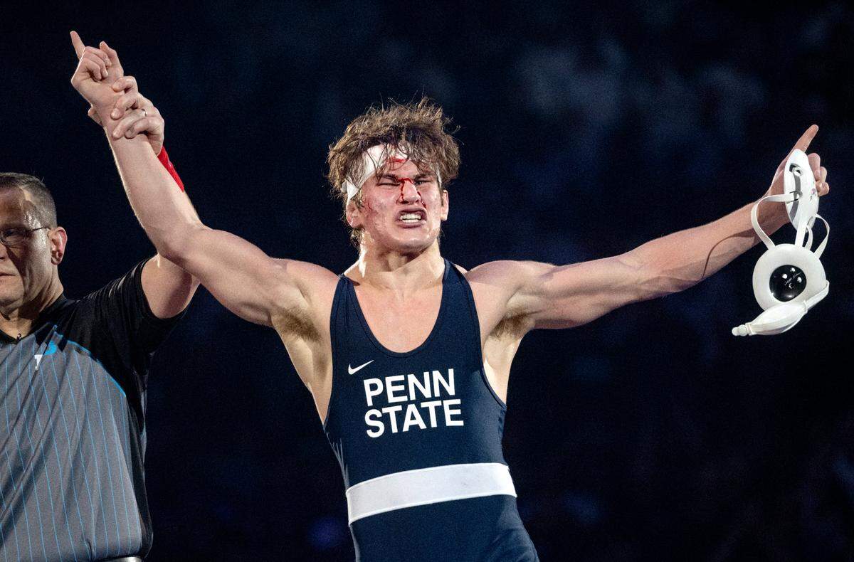 Penn State’s Tyler Kasak celebrates his win over Iowa’s Jacori Teemer in the 157-pound bout of the match on Friday, Jan. 31, 2025 at the Bryce Jordan Center.