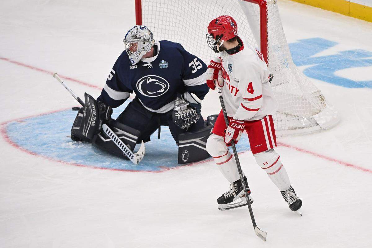 Apr 10, 2025; St. Louis, Missouri, UNITED STATES; Penn State Nittany Lions goaltender Arsenii Sergeev (35) defends the net agent the Boston University Terriers during the first period of the Frozen Four college ice hockey national semifinals at Enterprise Center. Mandatory Credit: Connor Hamilton-Imagn Images