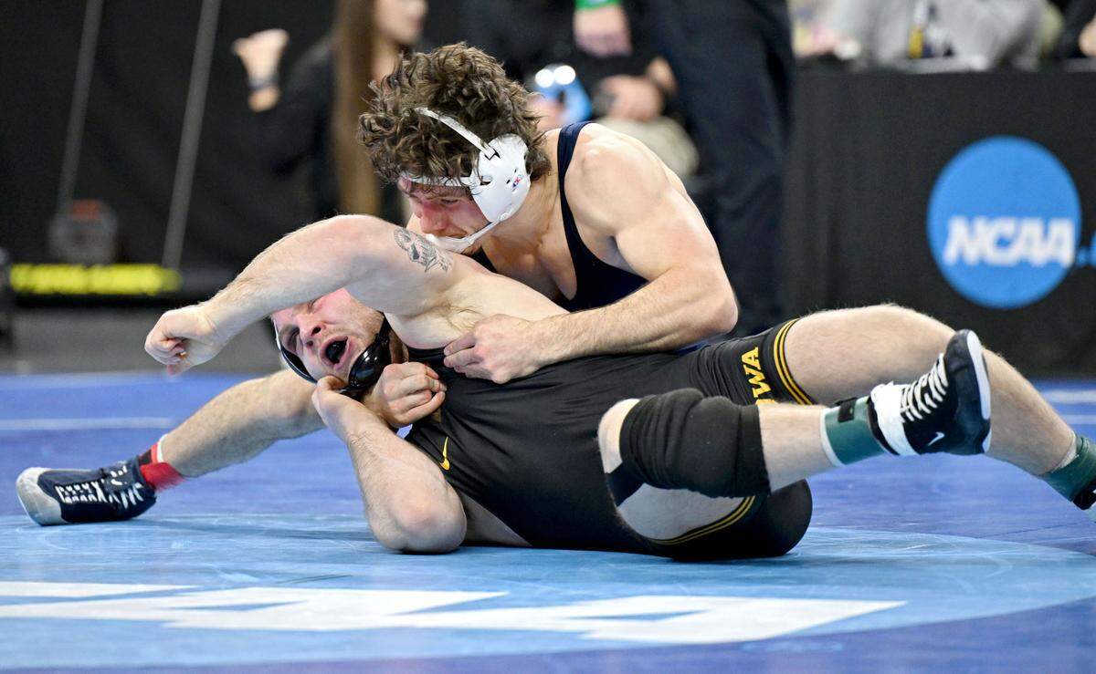 Penn State’s Levi Haines controls Iowa’s Patrick Kennedy in the 174-pound third place bout at the 2025 NCAA Wrestling Championships in Philadelphia’s Wells Fargo Center on Saturday, March 22, 2025.  