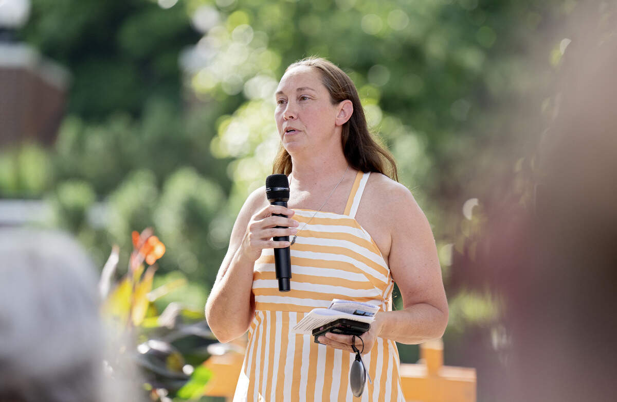 Pam Etters talks about the “Looking at US: Celebrating America’s 250th” installation during a ribbon cutting ceremony on Wednesday, July 1, 2026. Etters installed the large-scale murals across downtown State College.