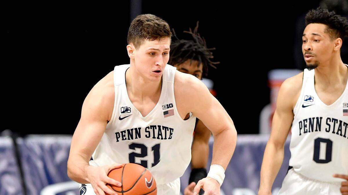 Penn State’s John Harrar dibbles down the court with the ball during the game against Purdue on Friday, Feb. 26, 2021 at the Bryce Jordan Center.