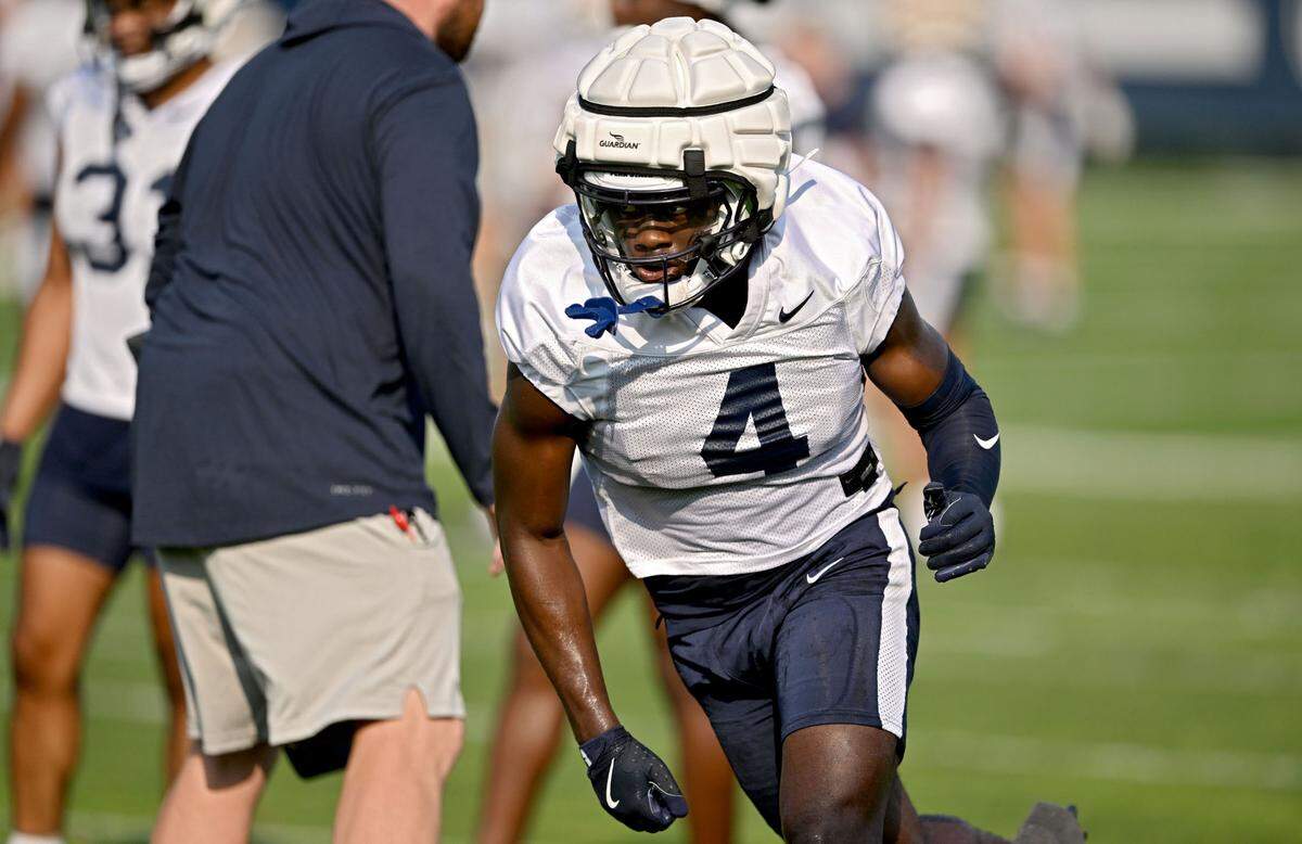 Penn State wide receiver Tyseer Denmark runs a drill at practice on Wednesday, July 31, 2024.