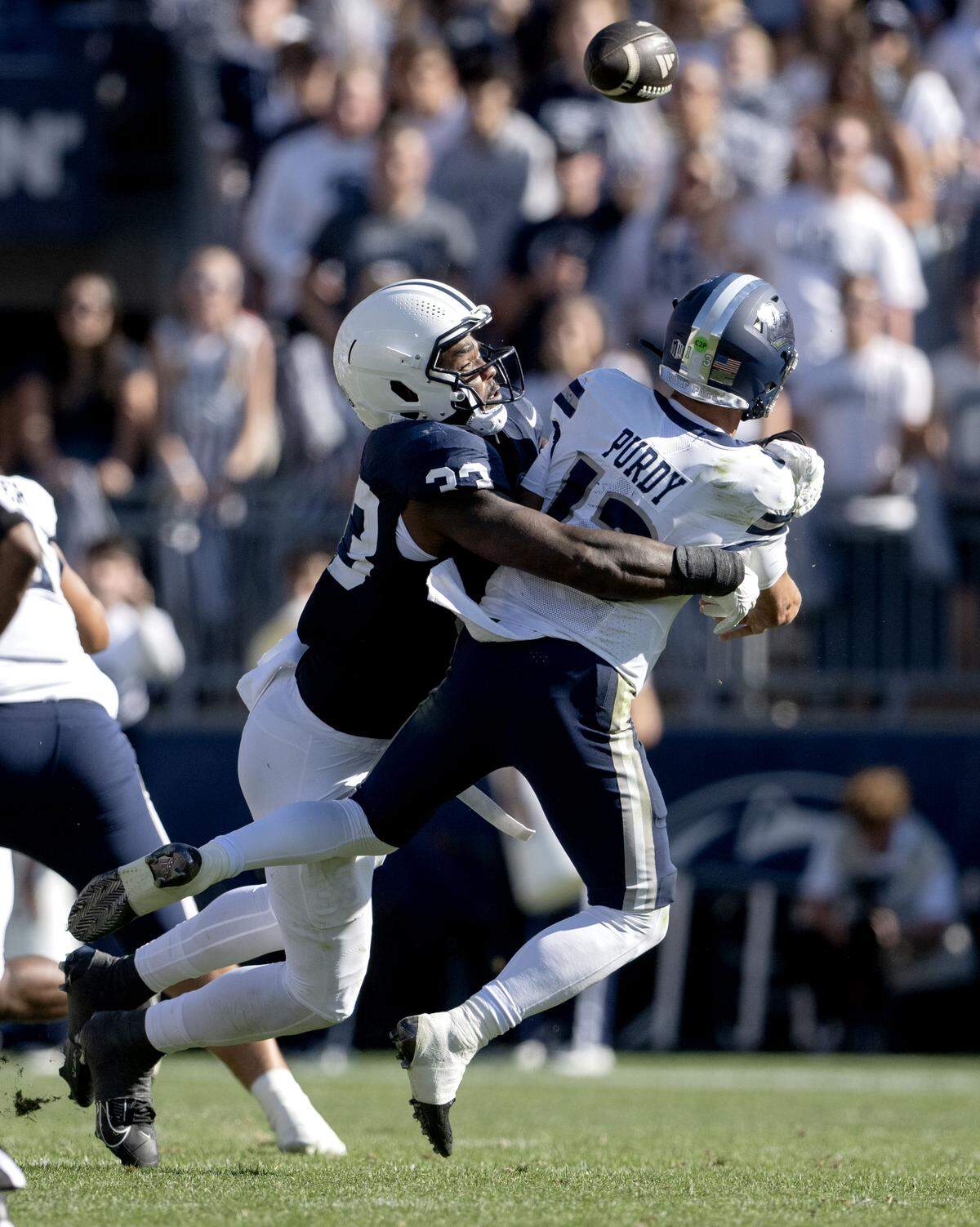 Penn State defensive end Dani Dennis-Sutton tackles Nevada quarterback Chubba Purdy as he tries to make a pass during the game on Saturday, Aug. 30, 2025 at Beaver Stadium.