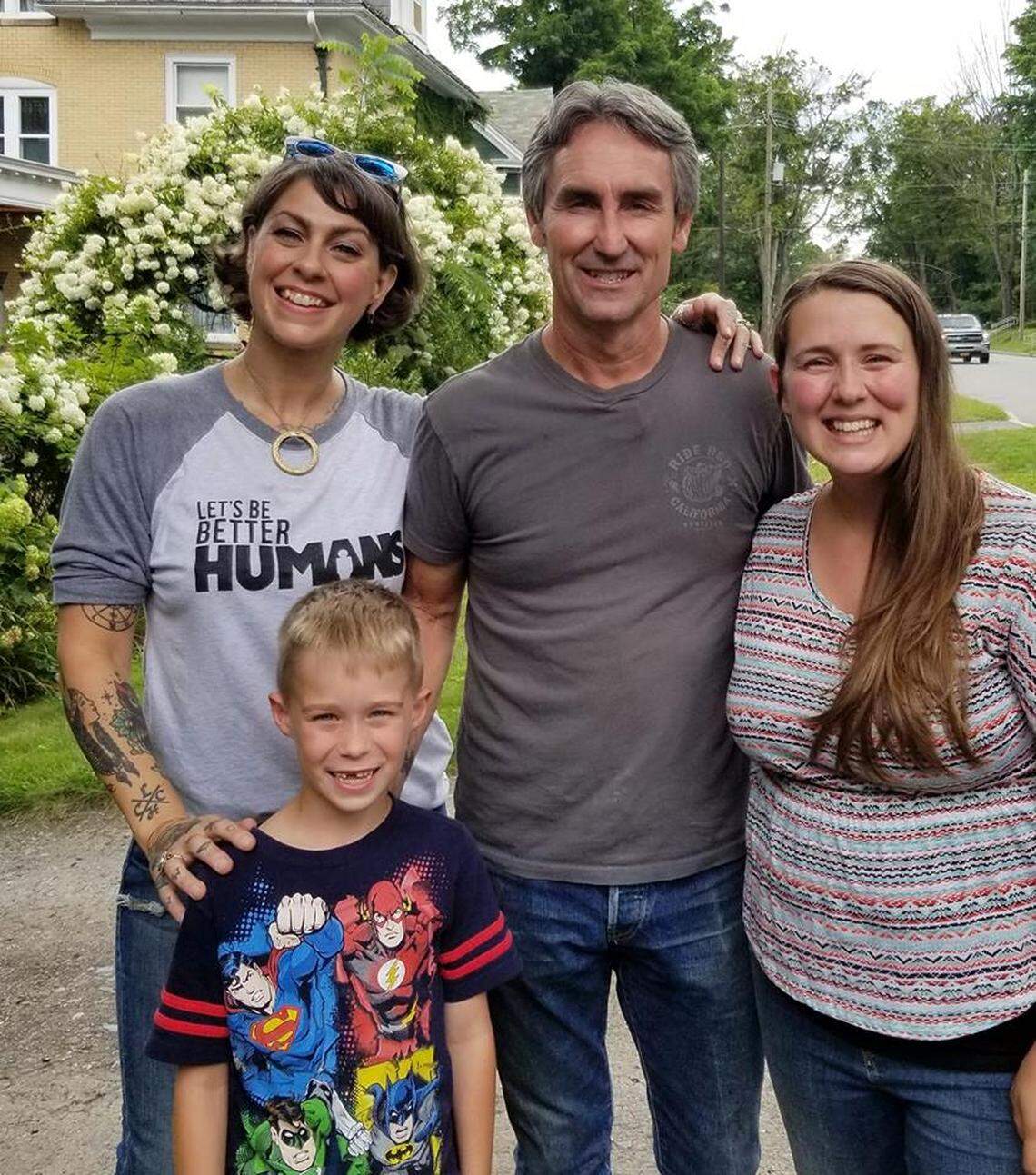 Clockwise from back left: Danielle Colby Cushman and Mike Wolfe, of the History Chanel’s “American Pickers” take time out of shooting an episode on South Centre Street in Philipsburg to pose for a photos with fans Denae Vigilante and her son, Stephen Vigilante.