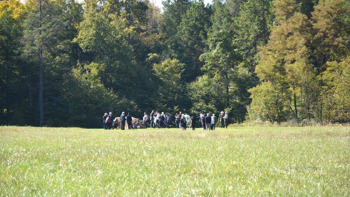 Family members of those people who were on Flight 93 on Sept. 11, 2001, that crashed in a field near Shanksville, lay a wreath at the site of the crash.