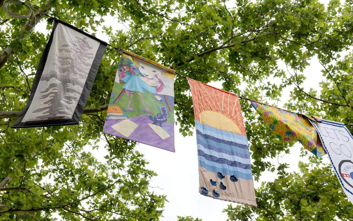 Each year banners are created to hang above the visitors and artists at the Central Pennsylvania Festival of the Arts.