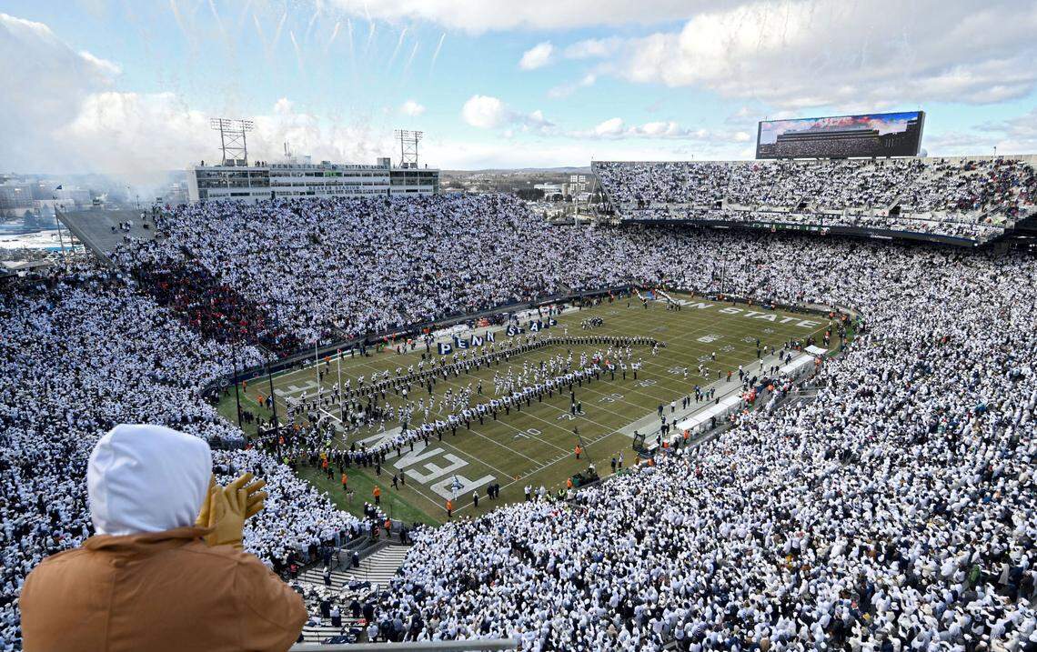 Penn State football runs onto the field for the CFP first round game against SMU on Saturday, Dec. 21, 2024 at Beaver Stadium.