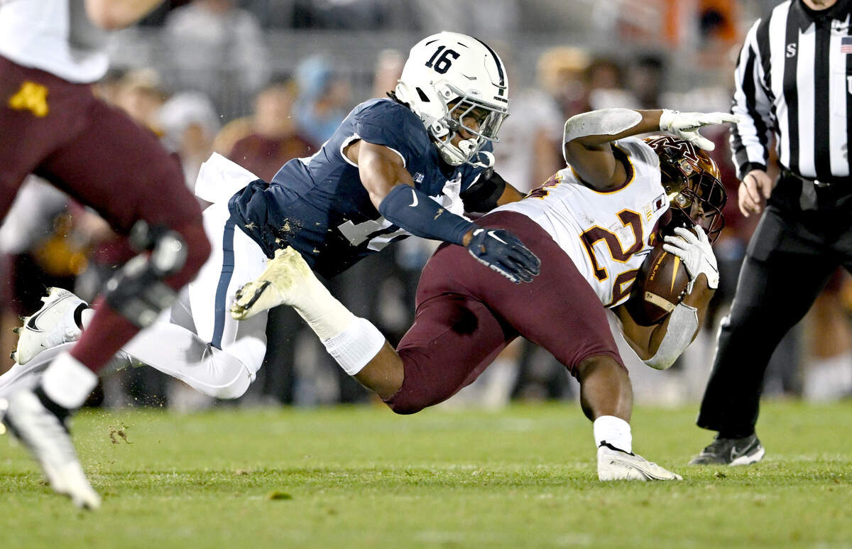 Penn State safety Ji’Ayir Brown stops Minnesota ball carrier Mohamed Ibrahim during the game on Saturday, Oct. 22, 2022.