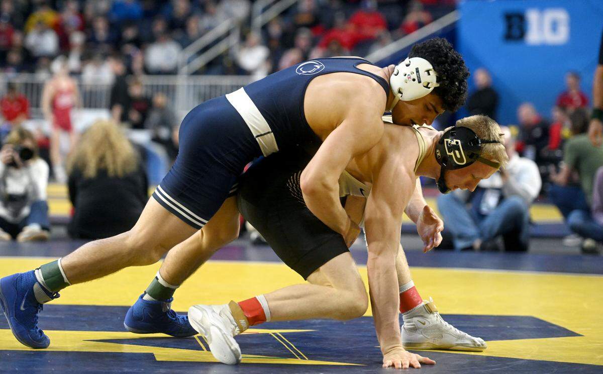Penn State’s Beau Bartlett controls Purdue’s Parker Fillius in a 141 lb bout at the Crisler Center on Sunday, March 5, 2023.