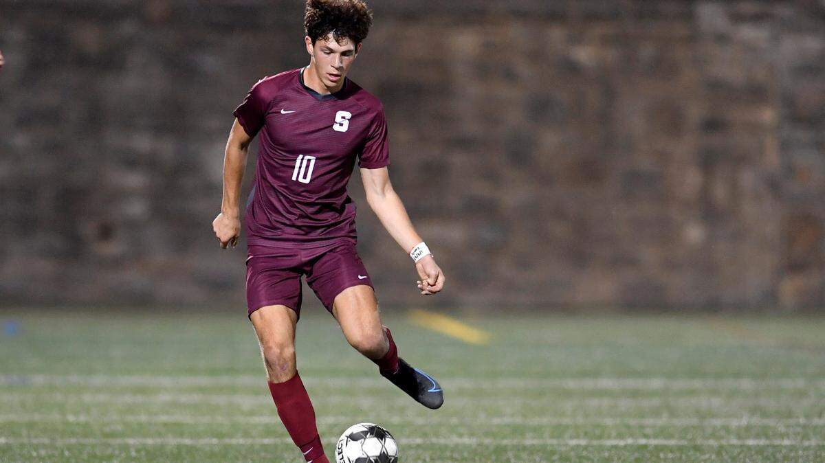 State CollegeÕs Carson Litzinger runs with the ball during the game against Peters Township in the first round of the PIAA tournament on Tuesday, Nov. 9, 2021 at Memorial Field.