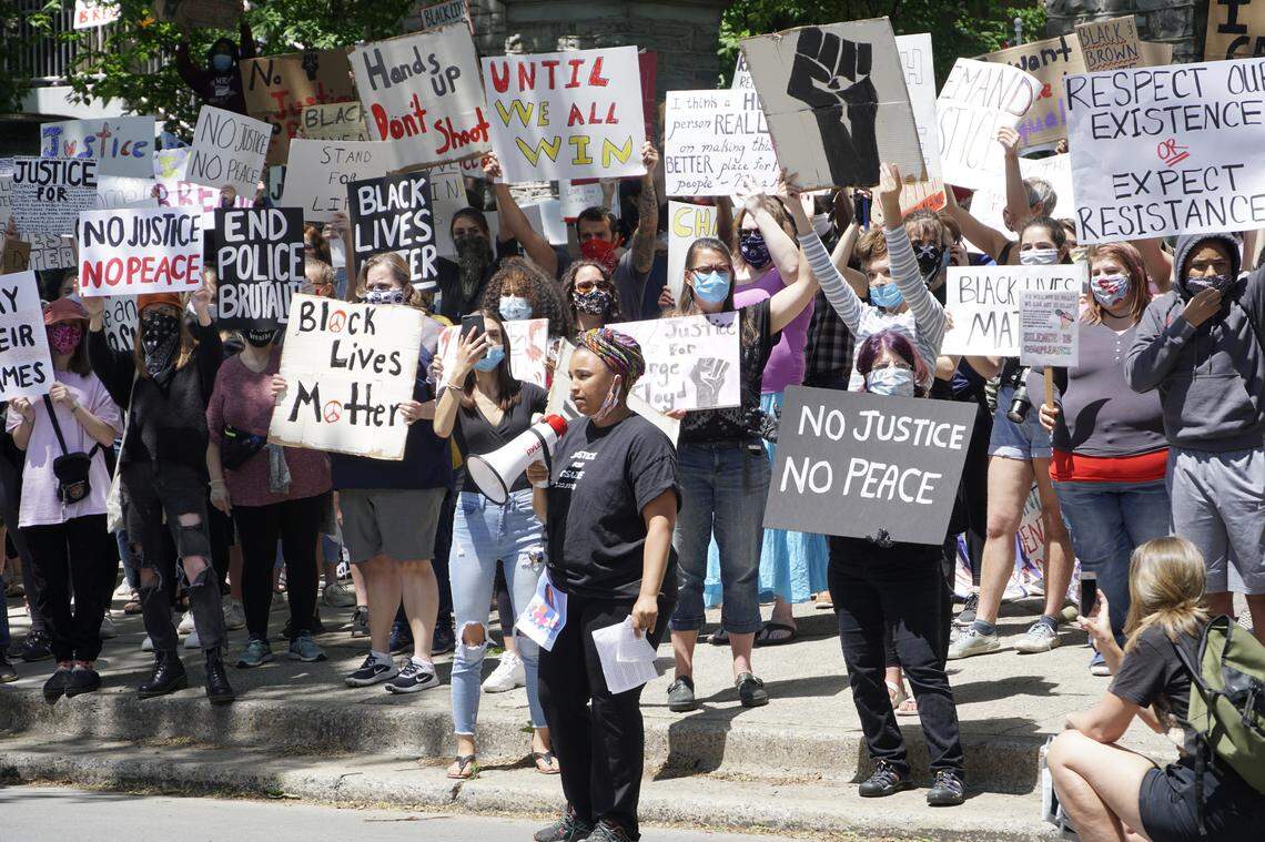 Hundreds of people attended a rally in support of justice for George Floyd Sunday in downtown State College.
