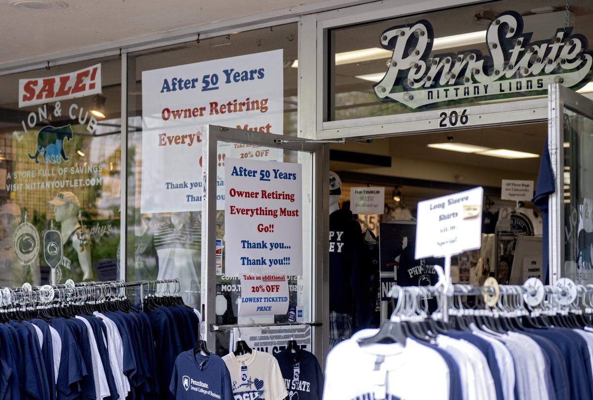 Signs promoting sales at Lion & Cub at 206 E. College Ave are pictured on Wednesday, May 13, 2026. 