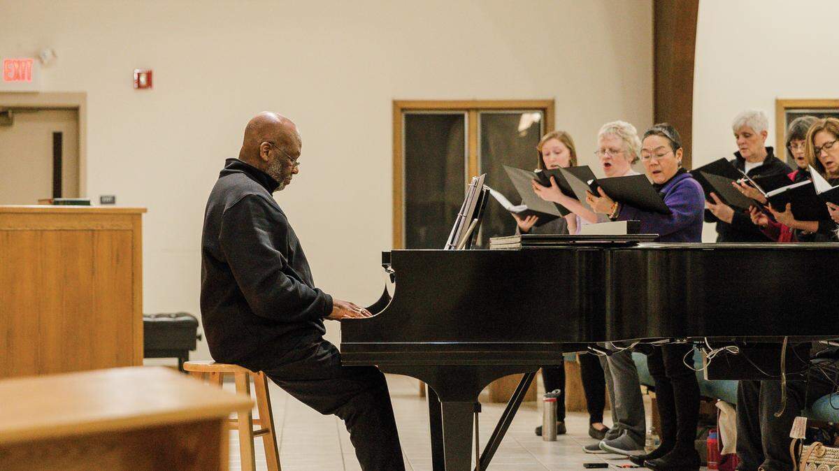 Essence 2, a community choir led by Tony Leach, celebrates its 20th anniversary this year.