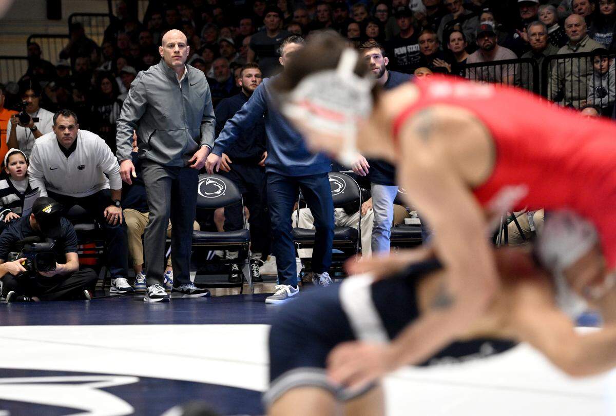 Penn State wrestling coach Cael Sanderson watches Aaron Nagao during his 133 lb bout against Ohio State’s Nic Bouzakis during the match on Friday, Feb. 2, 2024 in Rec Hall.