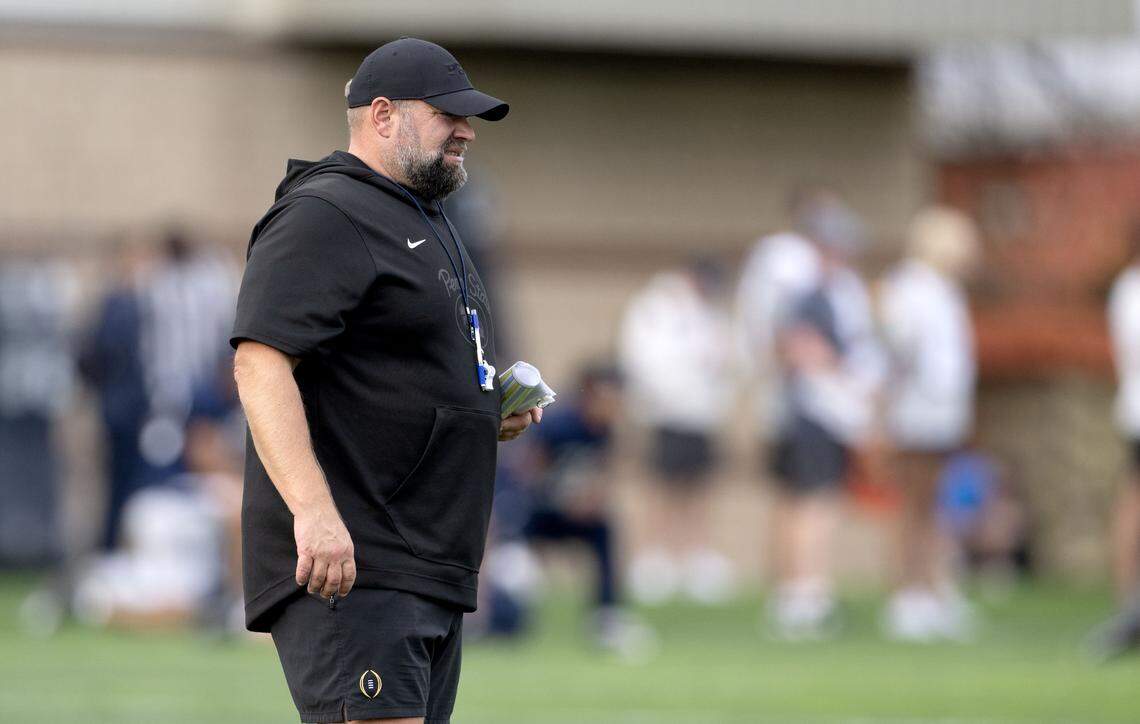 Penn State offensive coordinator Andy Kotelnicki watches a drill during practice on Tuesday, Sept. 16, 2025.
