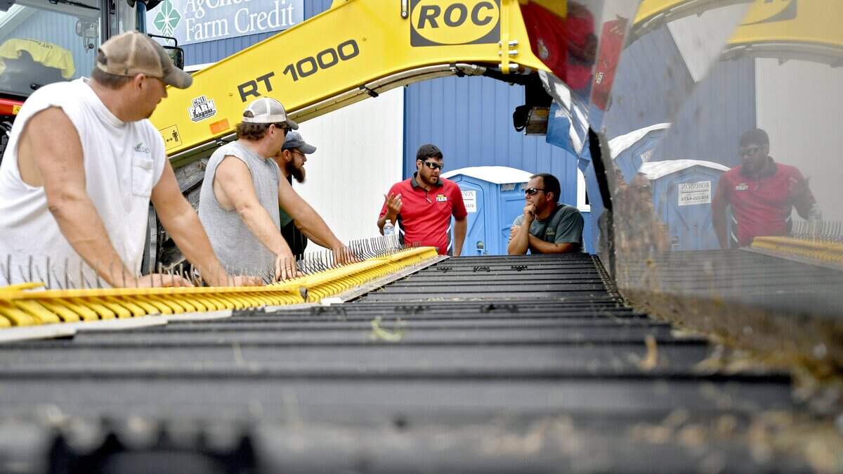 Visitors learn about the ROC hay merger from CNY Farm Supply at the 2016 Ag Progress Days.