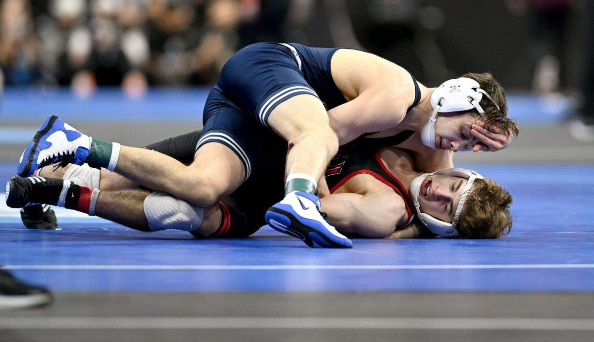 Penn State’s Luke Lilledahl controls NIU’s Blake West in the 125-pound bout during the 2025 NCAA Wrestling Championships in Philadelphia on Thursday, March 20, 2025.
