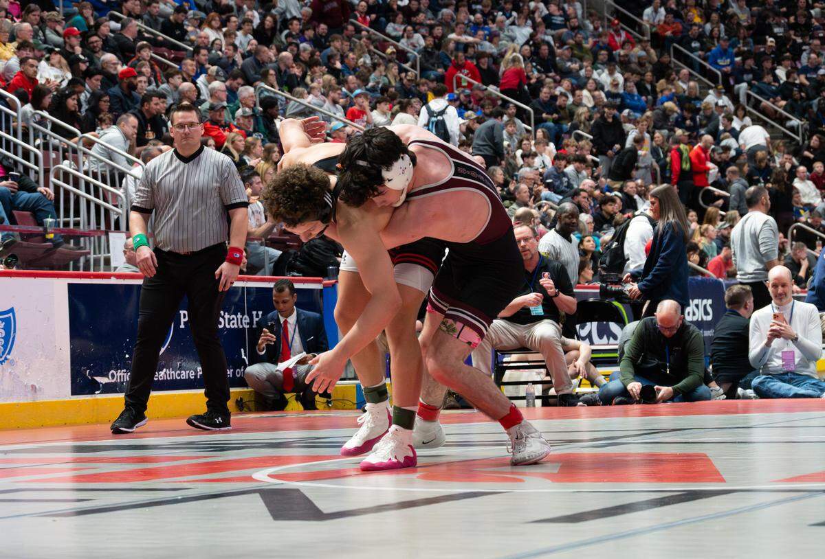 State High's James Whitbred goes for the takedown against Northampton Area's Gabriel Ballard in the 152-pound semifinals of the PIAA Class 3A Wrestling Championship in the Giant Center on Friday, March 6, 2026 in Hershey, Pa. Ballard defeated Whitbred by Tech Fall in 4:08.