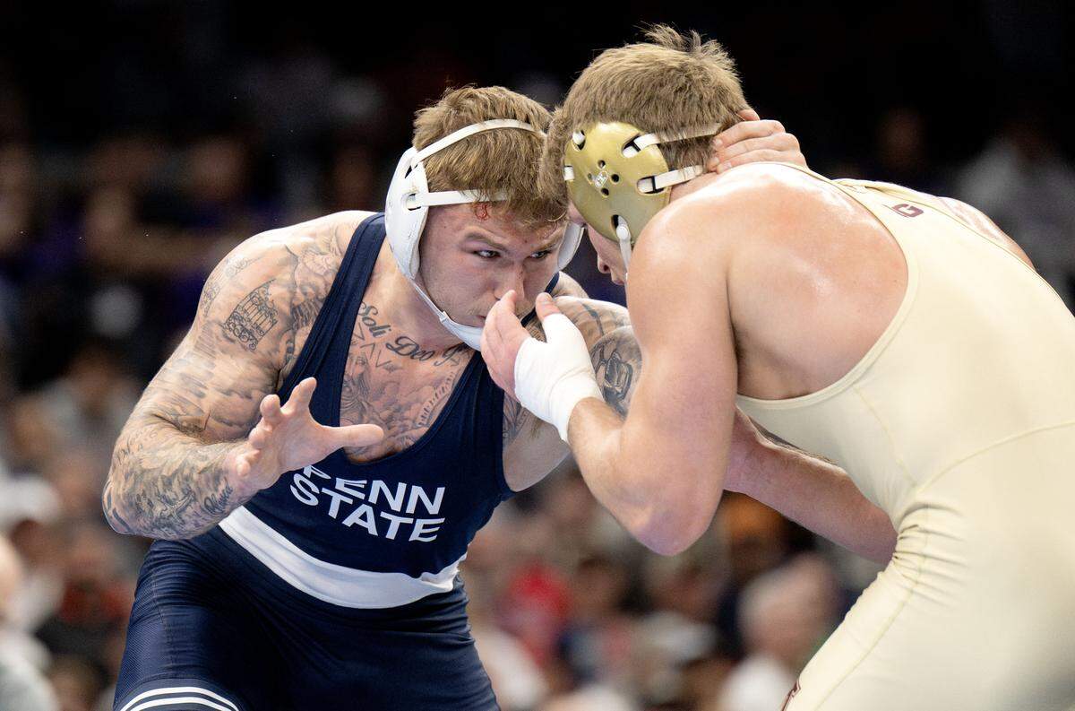 Penn State's Rocco Welsh wrestles Minnesota’s Max McEnelly in the 184-pound championship bout at the NCAA wrestling championships on Saturday, March 21, 2026.  