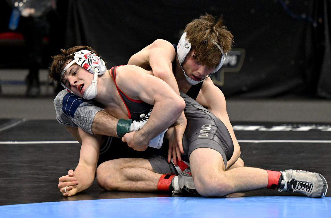 Ohio State’s Ben Davino and Penn State's Marcus Blaze wrestle in a 133-pound semifinal bout of the NCAA wrestling championships on Friday, March 20, 2026.
