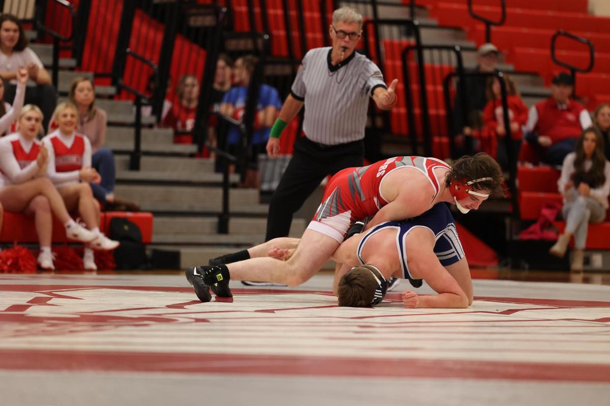 Bellefonte’s Nash Irwin looks to finish off a takedown of Penns Valley’s Brandon Corl in their 189 pound match of the Red Raiders’ 51-15 loss on Wednesday, Jan. 4, 2023. Irwin edged Corl, 3-2.