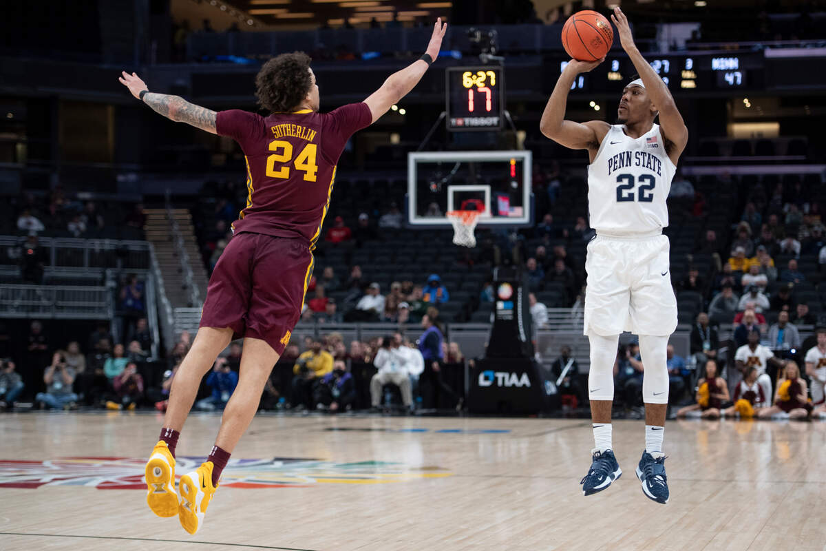 Penn State guard Jalen Pickett (22) shoots over Minnesota guard Sean Sutherlin (24) during a Big Ten basketball tournament game between Penn State and Minnesota at Gainbridge Fieldhouse on Wednesday, March 9, 2022 in Indianapolis, Ind.