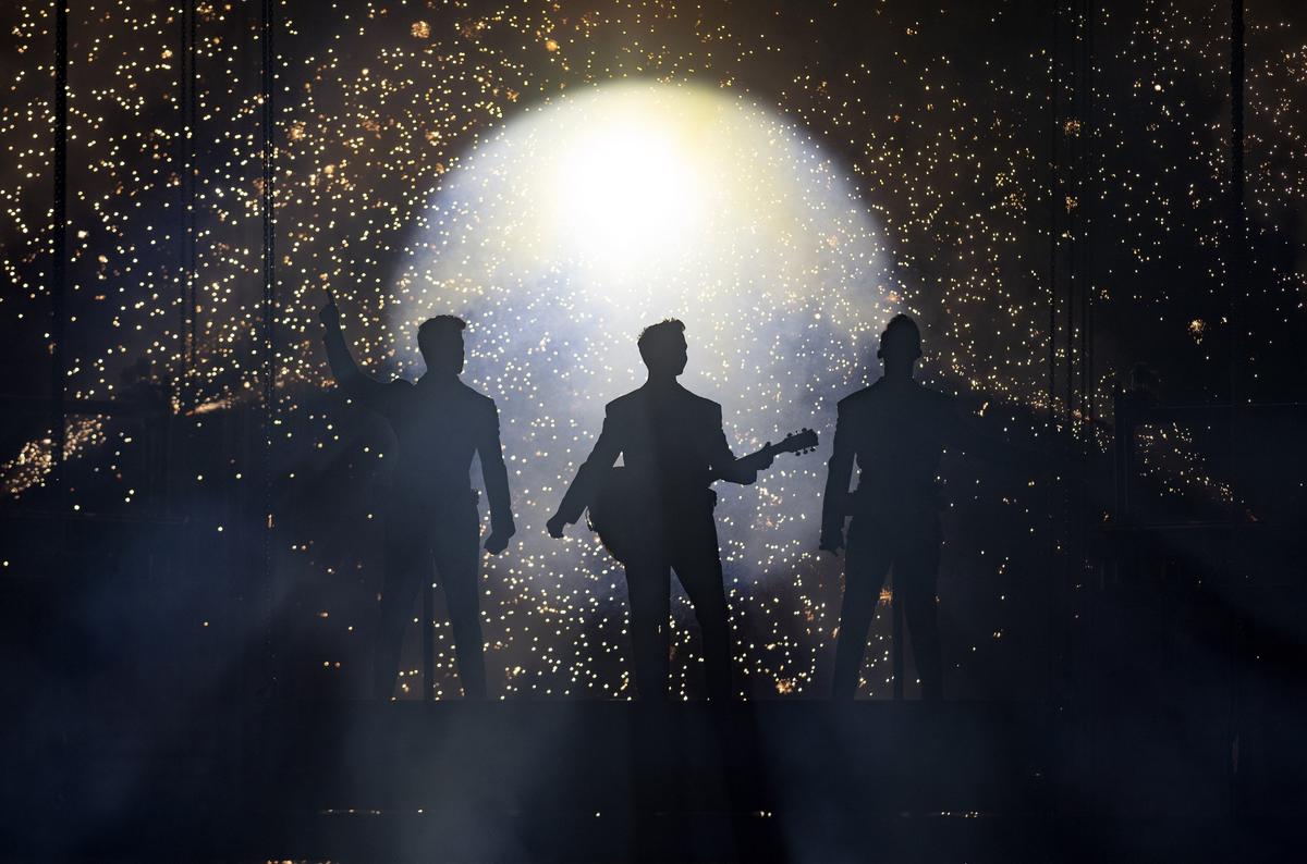 The Jonas Brothers are lowered onto the stage to entertain the Bryce Jordan Center as a part of their “Happiness Begins” tour on Wednesday, Sept. 4, 2019.