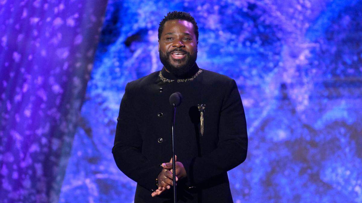 Feb 5, 2023; Los Angeles, CA, USA; Malcolm-Jamal Warner presents awards during the Grammy Awards Premiere Ceremony at the Microsoft Theater in Los Angeles on Sunday, Feb. 5, 2023.. Mandatory Credit: Robert Hanashiro-USA TODAY
